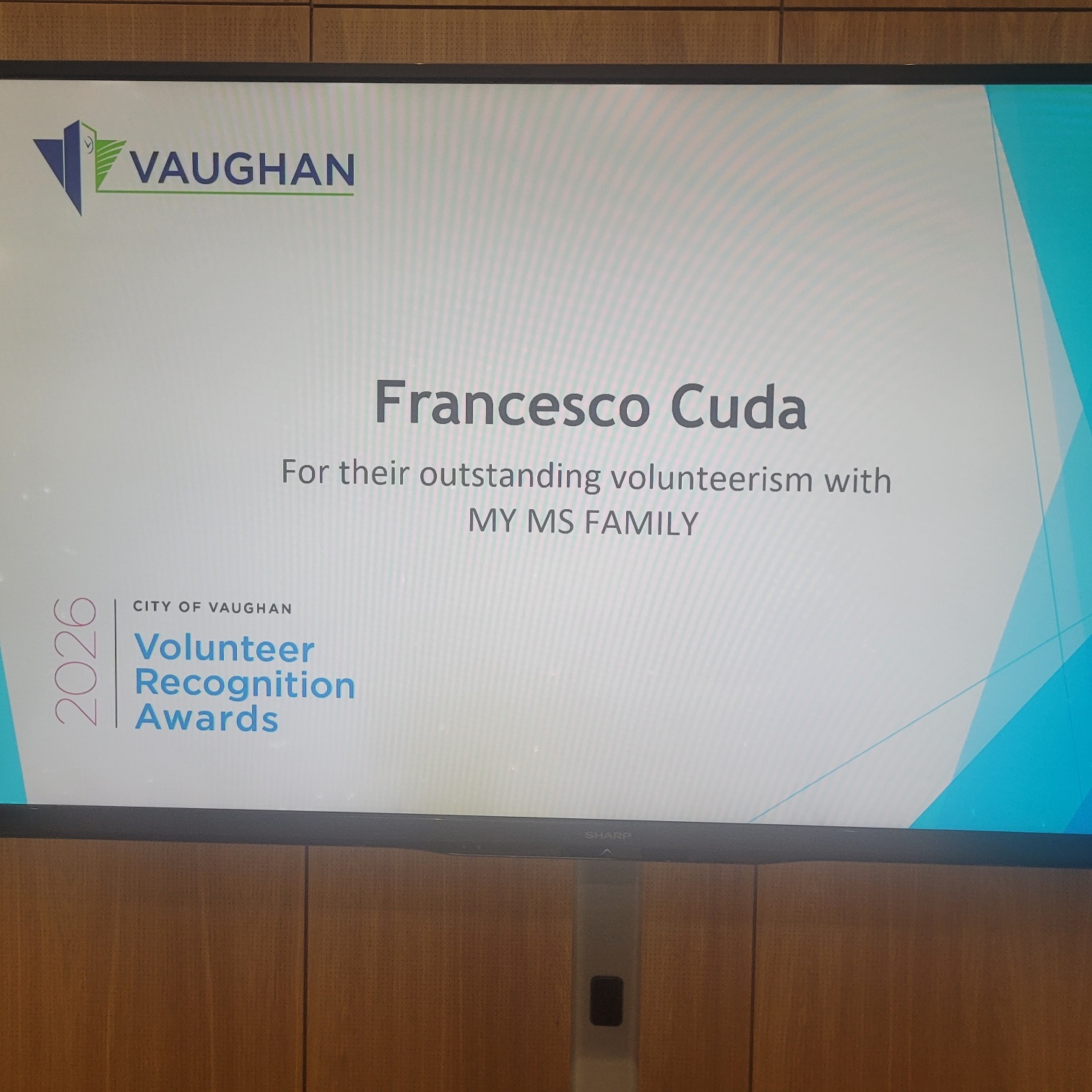 Award given to Francesco  Cuda is being displayed on the screen